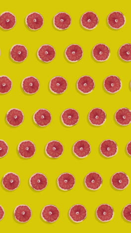 pattern of animated pink grapefruit in vertical