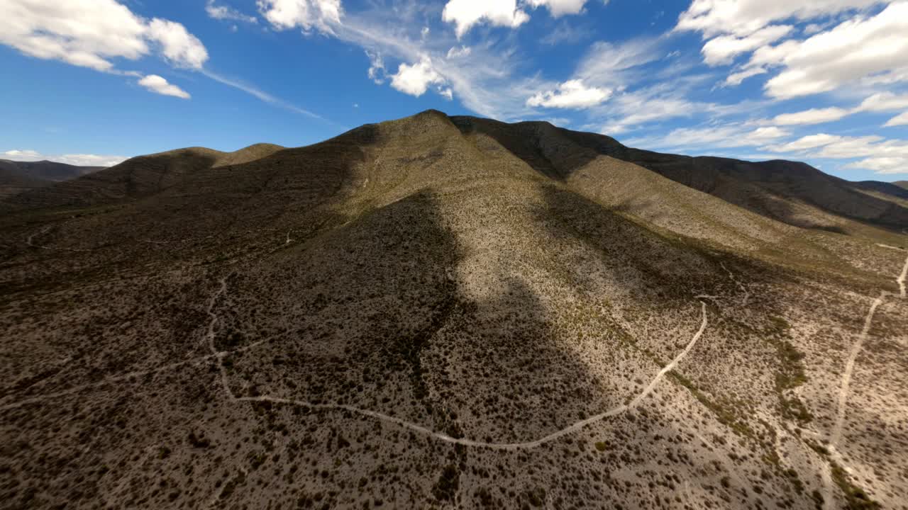 FPV DRONE SHOT OF A DESERT MOUNTAIN NEAR PARRAS, COAHUILA IN MEXICO