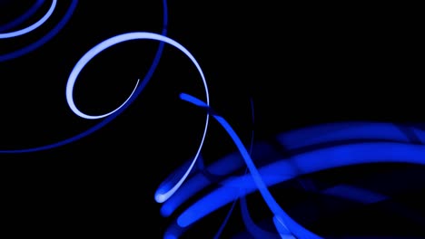 motion design bg of flow particles shaping lines, helix and abstract structures. blue lines swirling in spiral fly along swirling path. 3d render stylish creative abstract background in 4k.