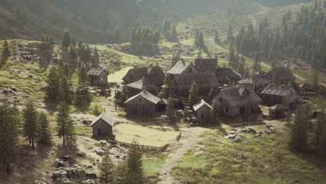 Old-wooden-village-on-the-rocky-mountain-background