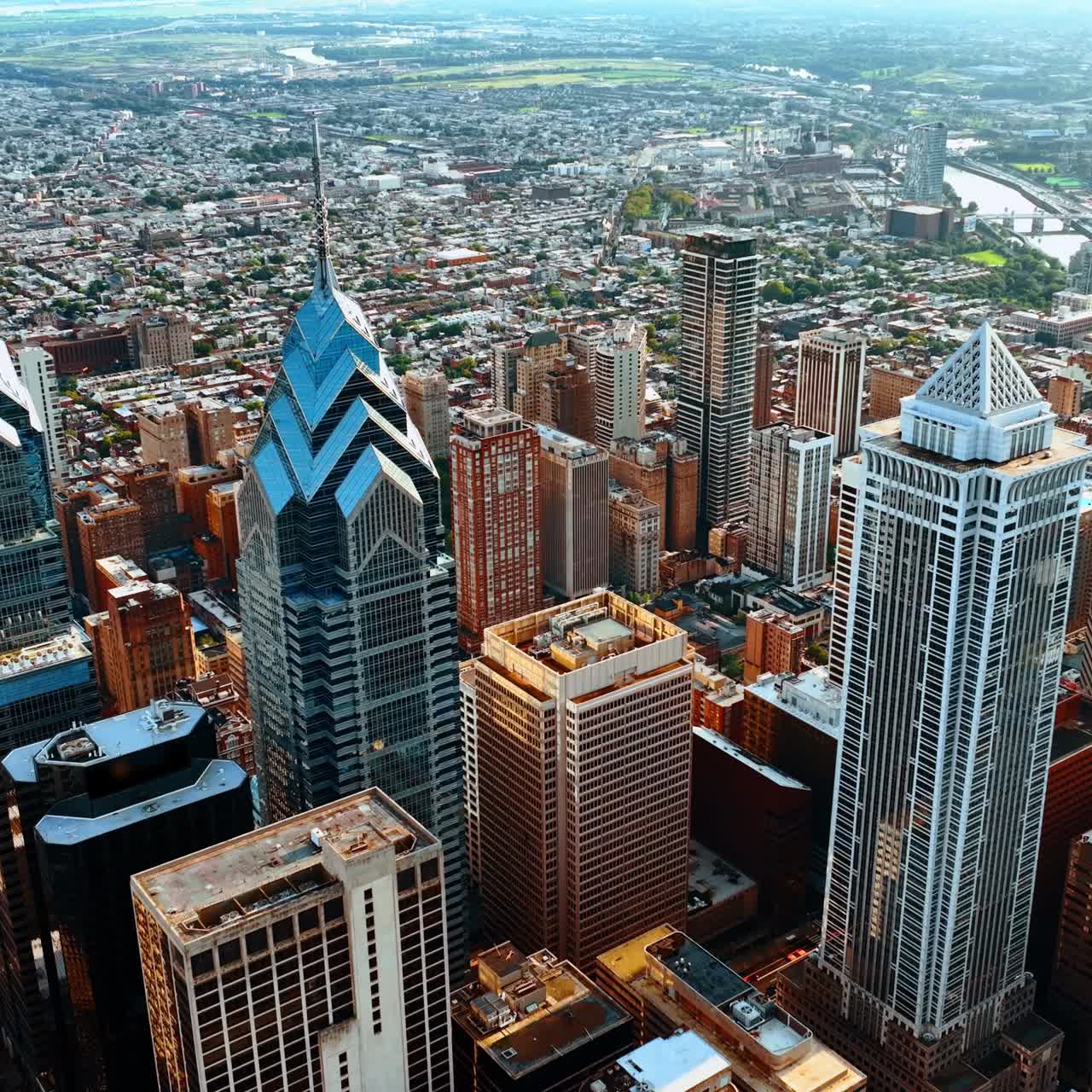 Remarkable view of Philadelphia downtown panorama. Drone footage distancing from the tops of gorgeous skyscrapers