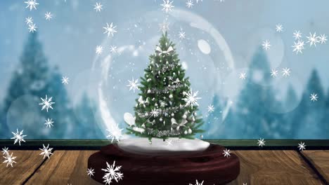 Animation-of-falling-snowflakes-over-christmas-snow-globe