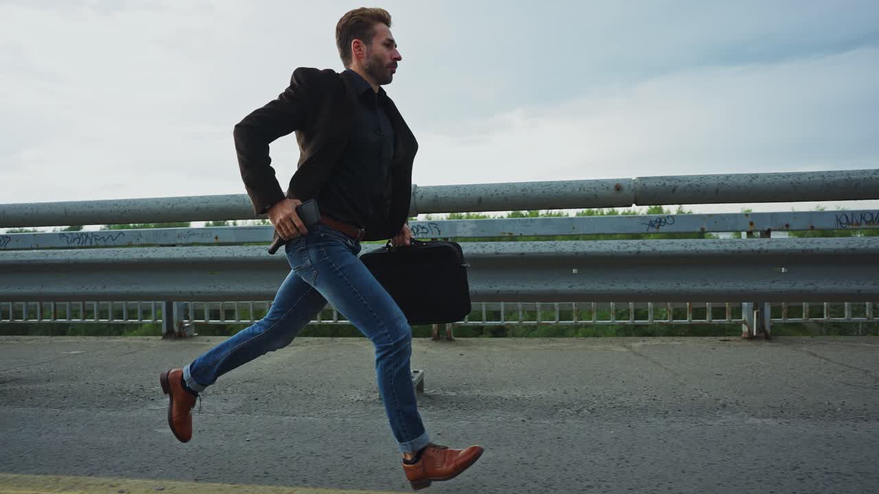Businessman Running on Bridge