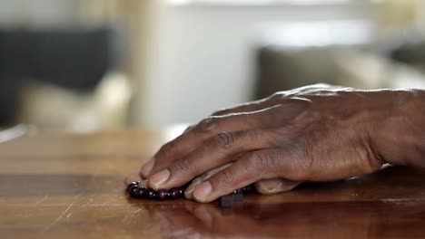 man-praying-to-God-with-cross-hand-together-with-people-stock-video-stock-footage