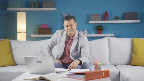 home office worker man looking emotional at camera.