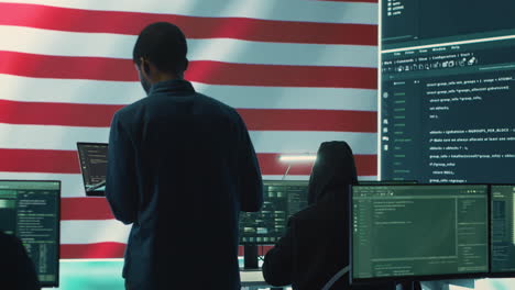 A-technical-team-in-a-governmental-cyber-environment-with-the-USA-flag