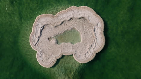 top view of salt island over the dead sea in israel