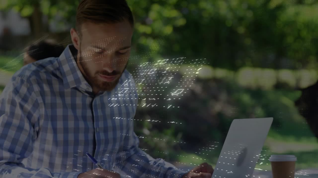 Man opening laptop beside notebook at cafe patio writing tech overlay intensifying for coding