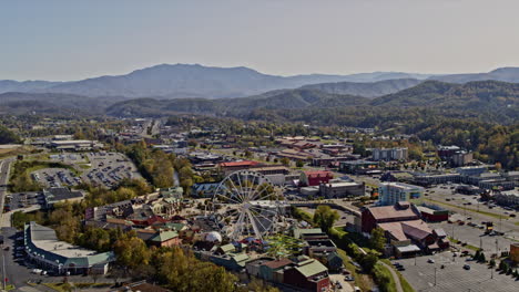 pigeon forge tennessee aerial v1 panoramic view around the island and intown cityscape with mountainous landscape background - shot with inspire 2, x7 camera - november 2020