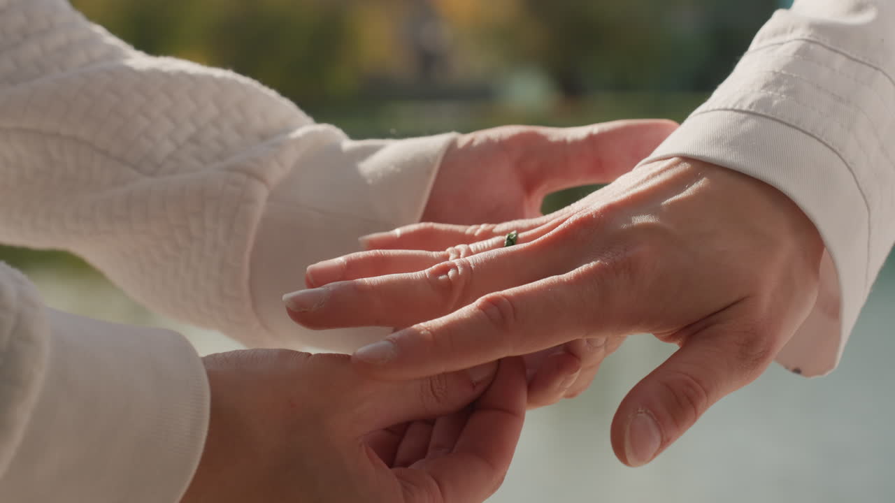 Serene lakeside wedding moment. Tranquil lakeside celebration highlighting familial unity and commitment. Gentle waterfront ceremony capturing intimate family bonds and sincere vows of love
