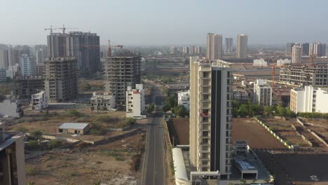 aerial view of a city with new construction and modern buildings