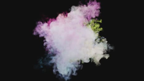 several explosions of colorful multicolored smoke and powder. colored smoke blended on a black isolated background with an alpha channel.