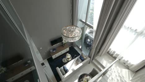 high ceiling duplex apartment decoration from top view showing the living area