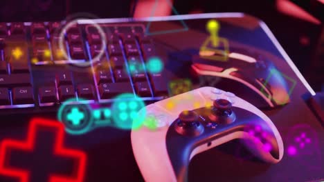 animation of neon icons over video game computer equipment