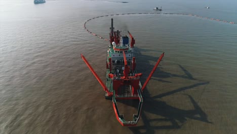 aerial view of a trailing suction hopper dredger at work