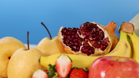 vibrant fruits displayed with focus on pomegranate