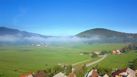 slovenia countryside with foggy fields