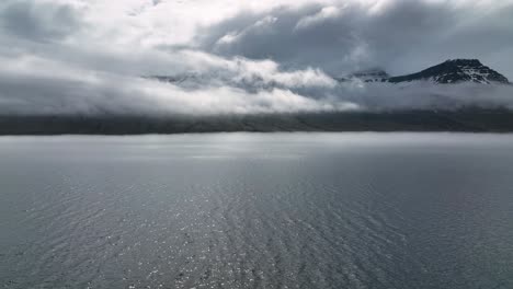 cloudy sky over faskrudsfjordur fjord in eastern iceland