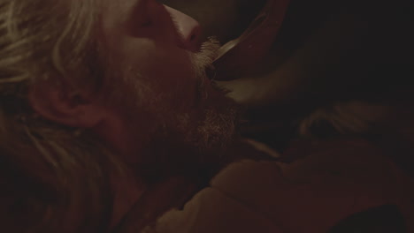 man drinking from a spoon