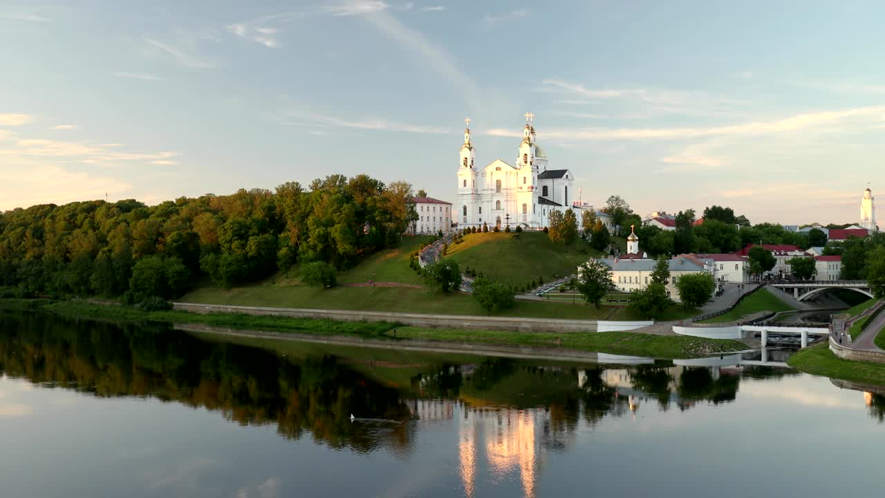 Vitebsk, Belarus. Assumption Cathedral Church In Upper Town On Uspensky Mount Hill And Dvina River In Summer Evening Sunset Time. Zoom, Zoom Out