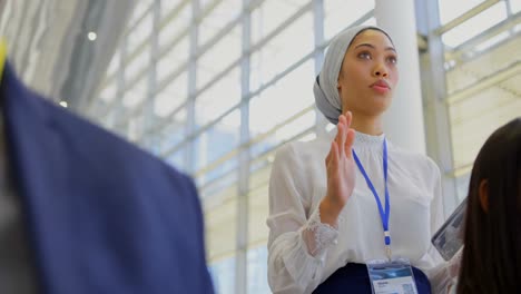 businesswoman interacting with the speaker in the business seminar 4k