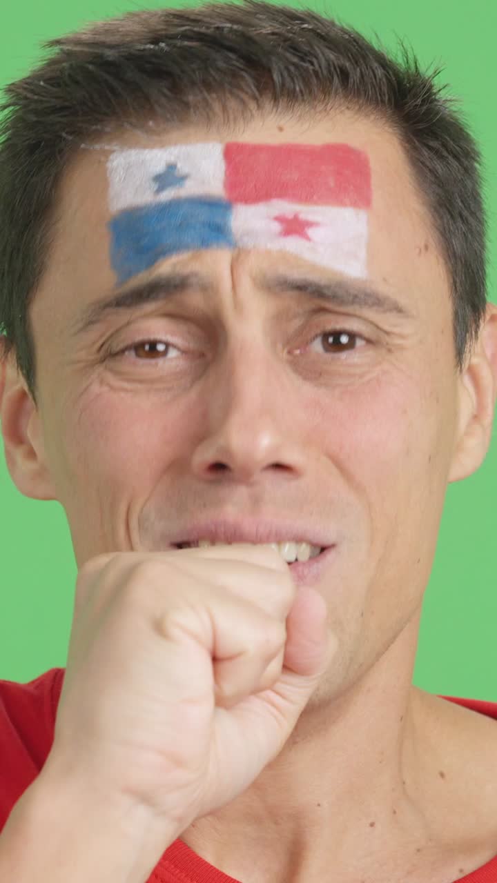 Very nervous man supporting panamanian team during a difficult match