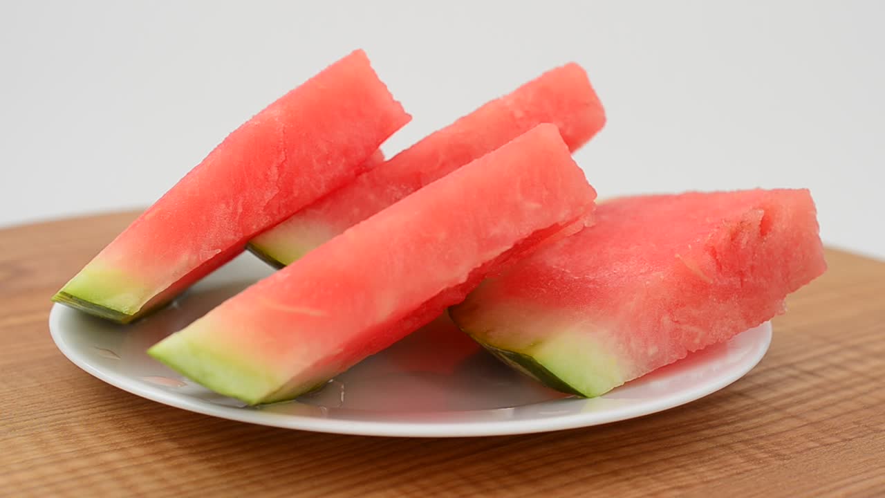 Shooting of a dish from a watermelon. Shooting in the movement