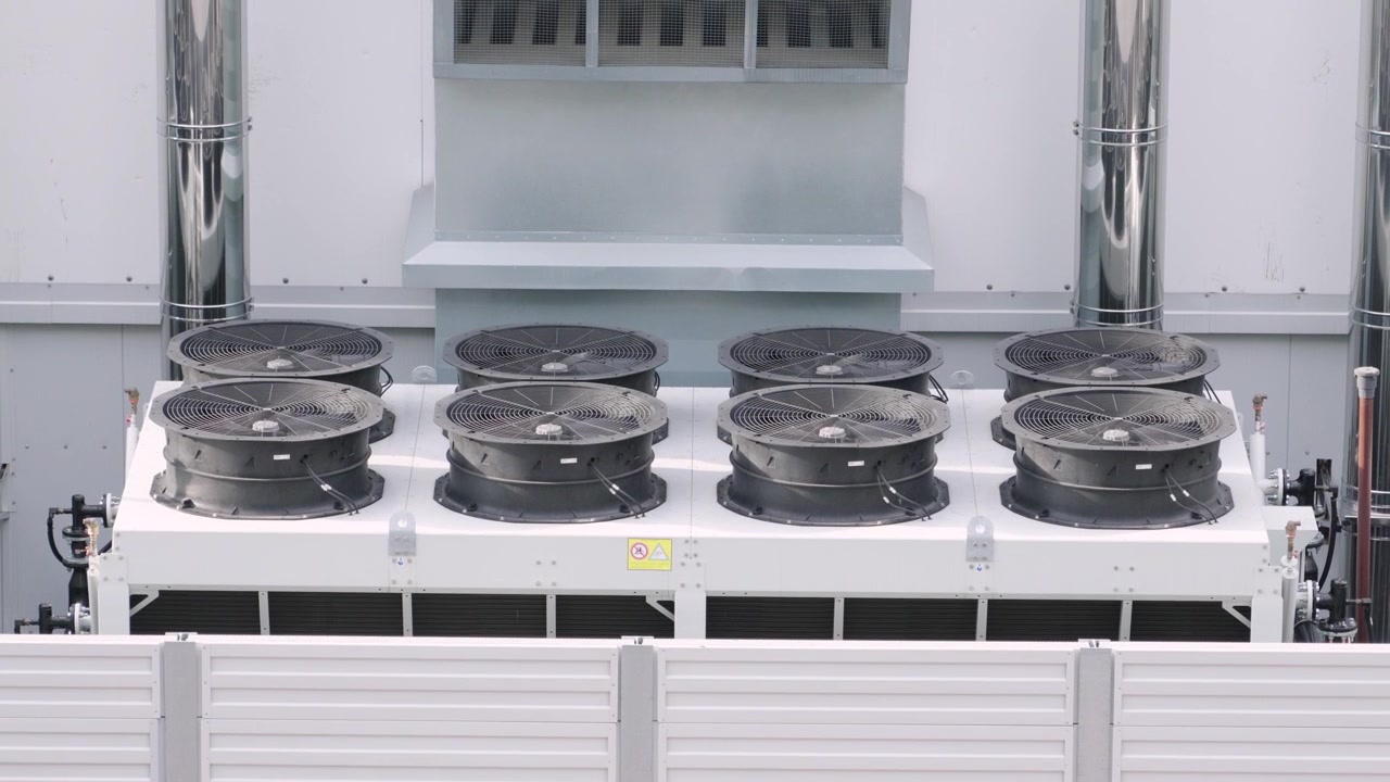 Industrial air conditioning system for a server room. Large fans spinning, providing cooling and ventilation for thermal management