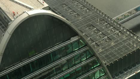 huge fans on the roof of a glass skyscraper in moscow near the river