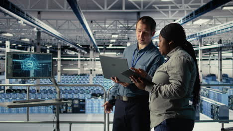 technicians working together in server room, optimizing deep learning ai systems