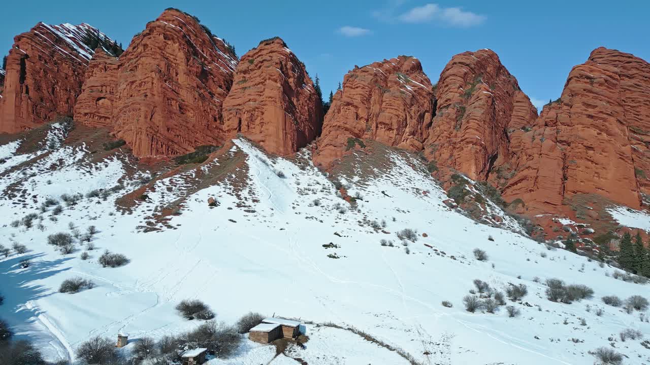 Seven bulls red rocks landmark, jagged elevations, remote winter scene