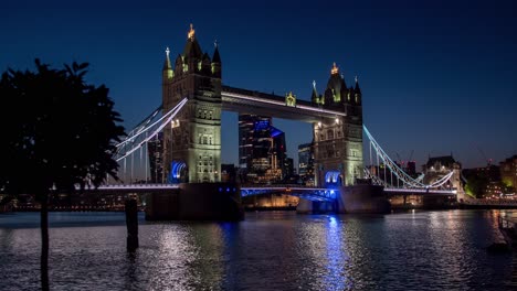 dramatic time-lapse of tower bridge at night
