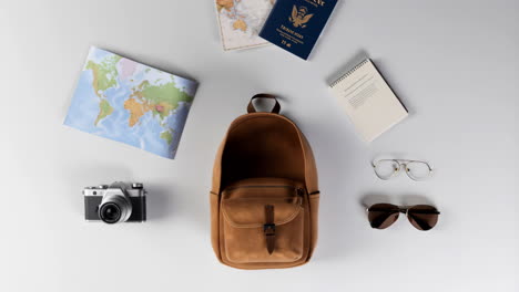 overhead view of travel essentials for an adventure