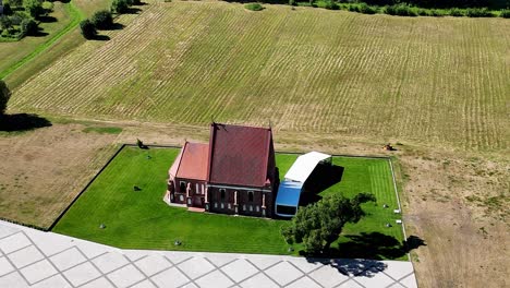 old st johns baptist church in lithuania, aerial orbit view