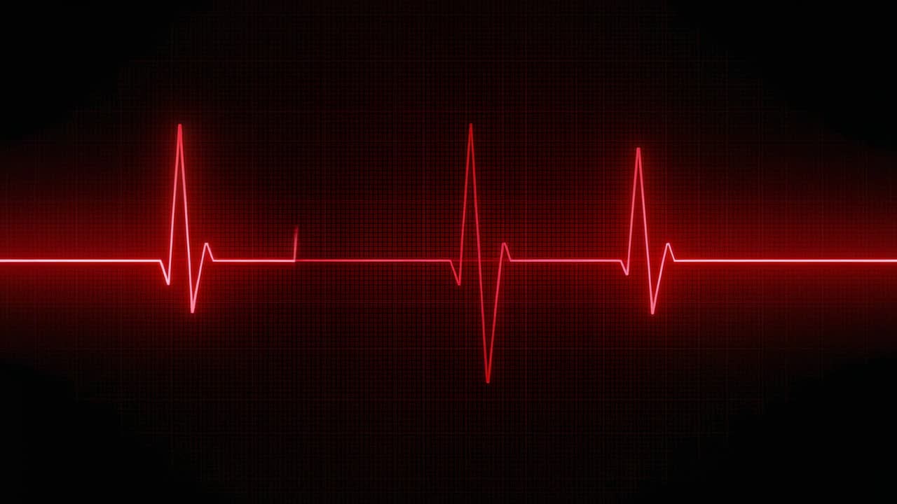 Traccia ECG al neon rosso pulsante che mostra il picco iniziale che innesca il battito cardiaco, griglia di base dello schermo scuro luminosa