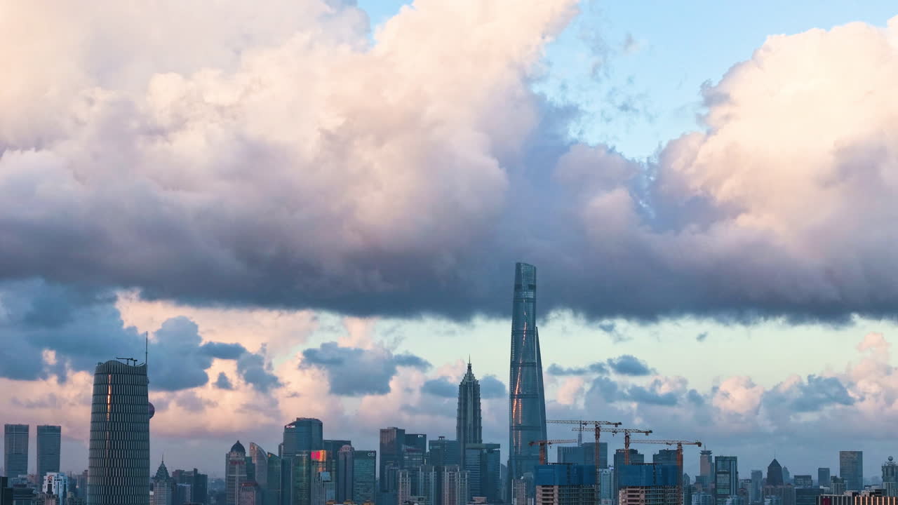 Aerial hyperlapse of dramatic sunset clouds moving over the Shanghai skyline