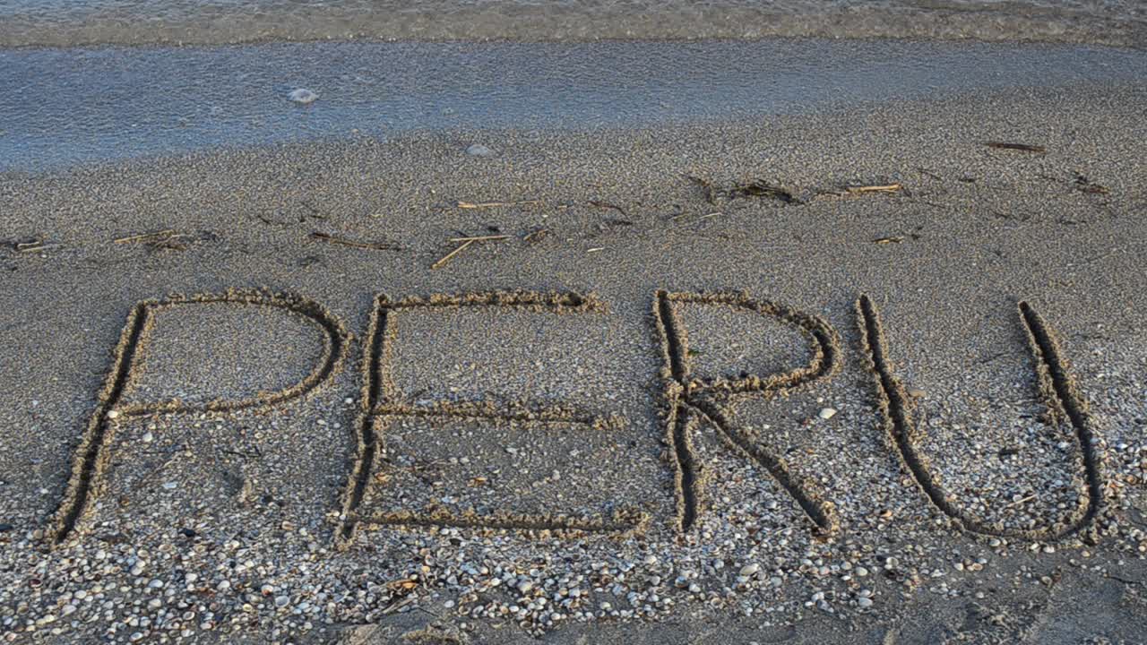 Peru: Inskripsjon i sanden. Skrift på sand, strand.