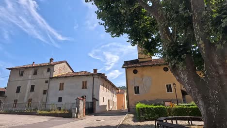 bell tower and buildings under a clear sky