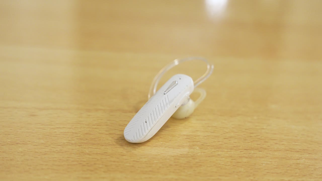 An earpiece for telephone use or making calls, close up detailed view