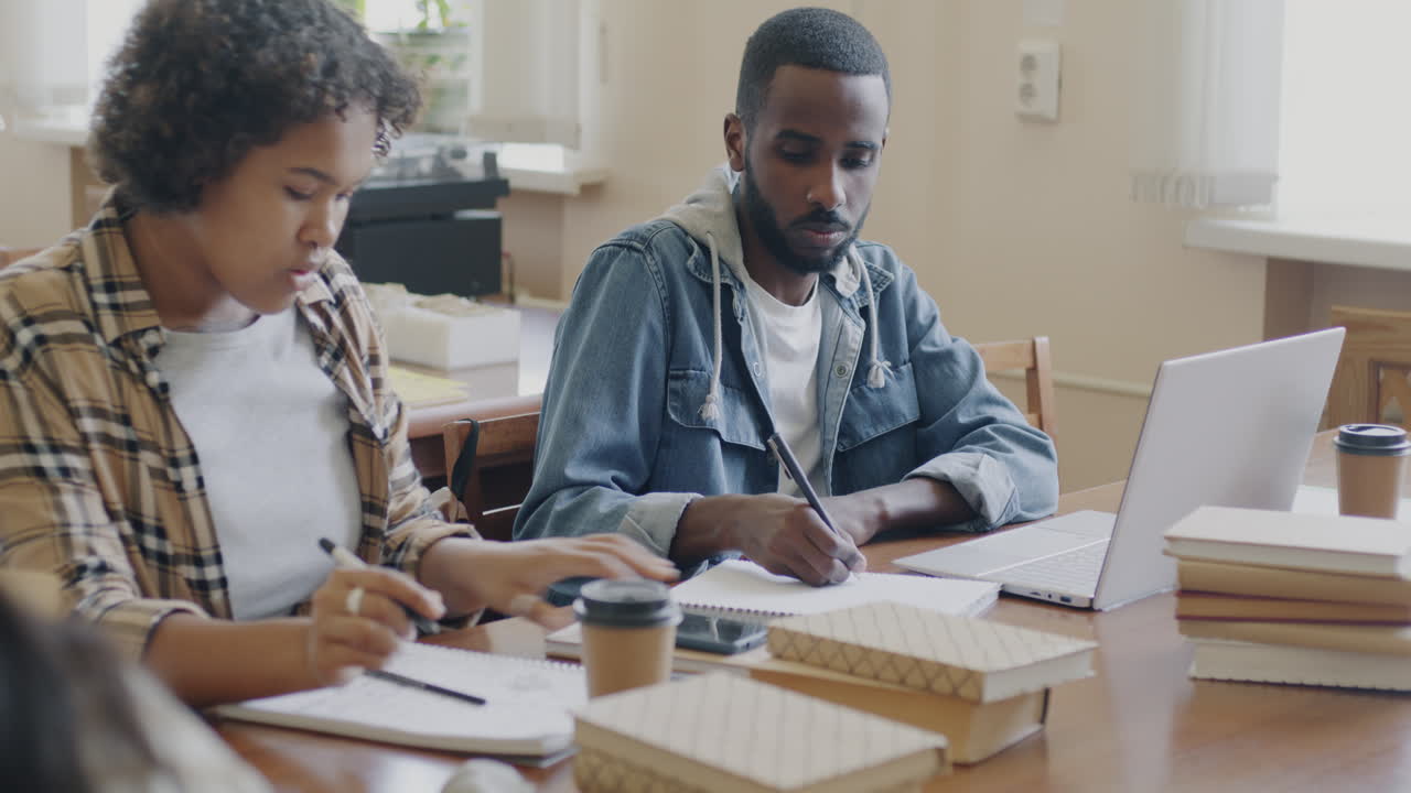 Students Studying in a Library