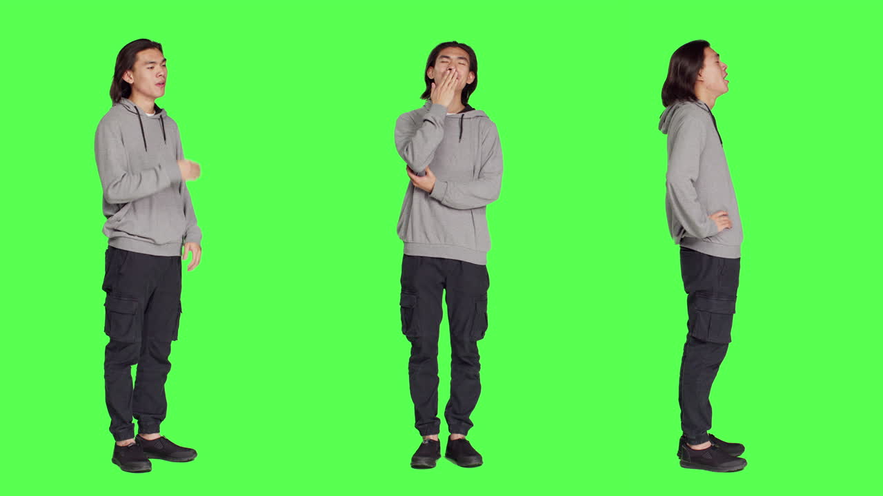 Young guy feeling sleepy and yawning