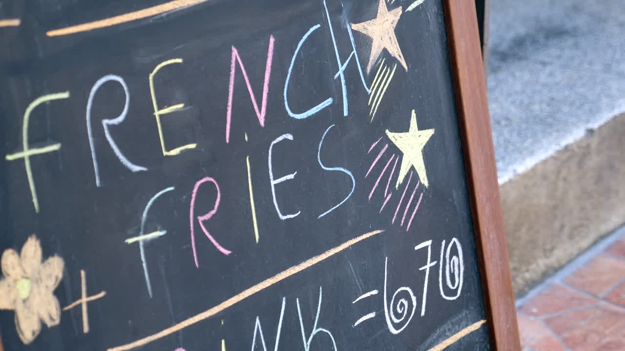Chalkboard menu with french fries special