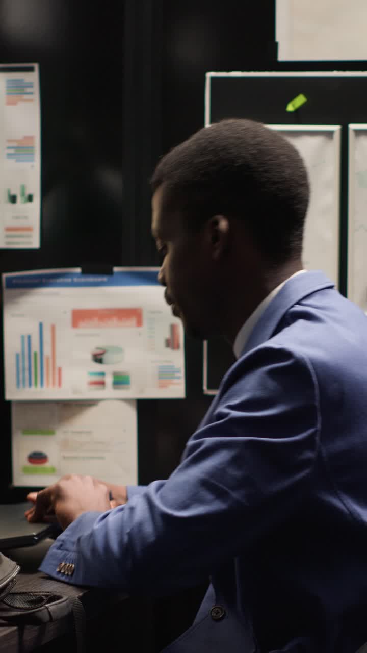 Man Working at Desk in Office