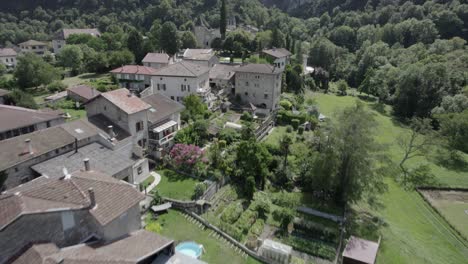 video cenital and bird's eye view plane with drone flying cognin les gorges above the town and houses