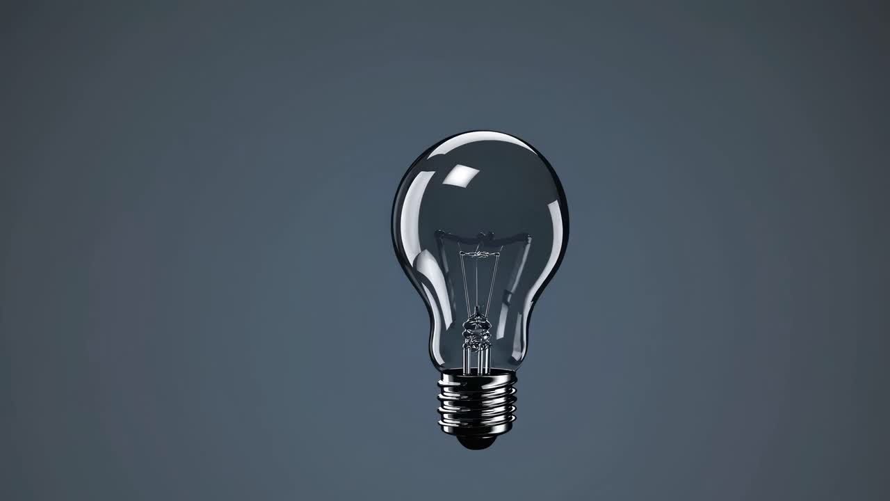 The video showcases a minimalist concept with a single light bulb floating against a dark