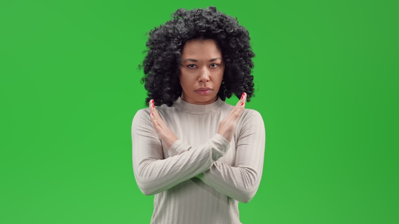 Green Screen young african female shows gesture no