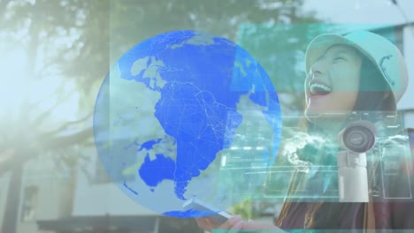 Animation-of-data-processing-and-globe-over-asian-woman-using-smartphone