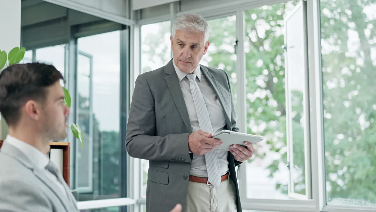 Meeting, tablet and a senior man CEO talking to