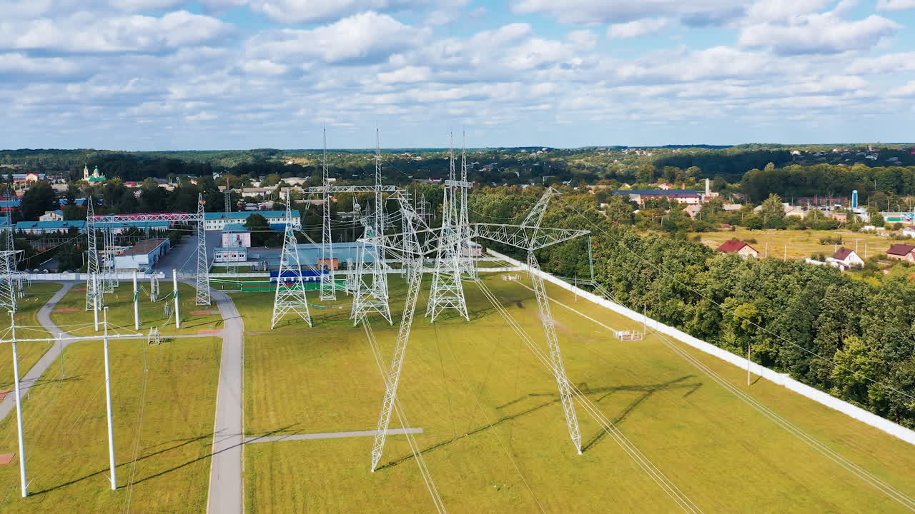 High voltage tower electricity station. Aerial view of electrical voltage wires.