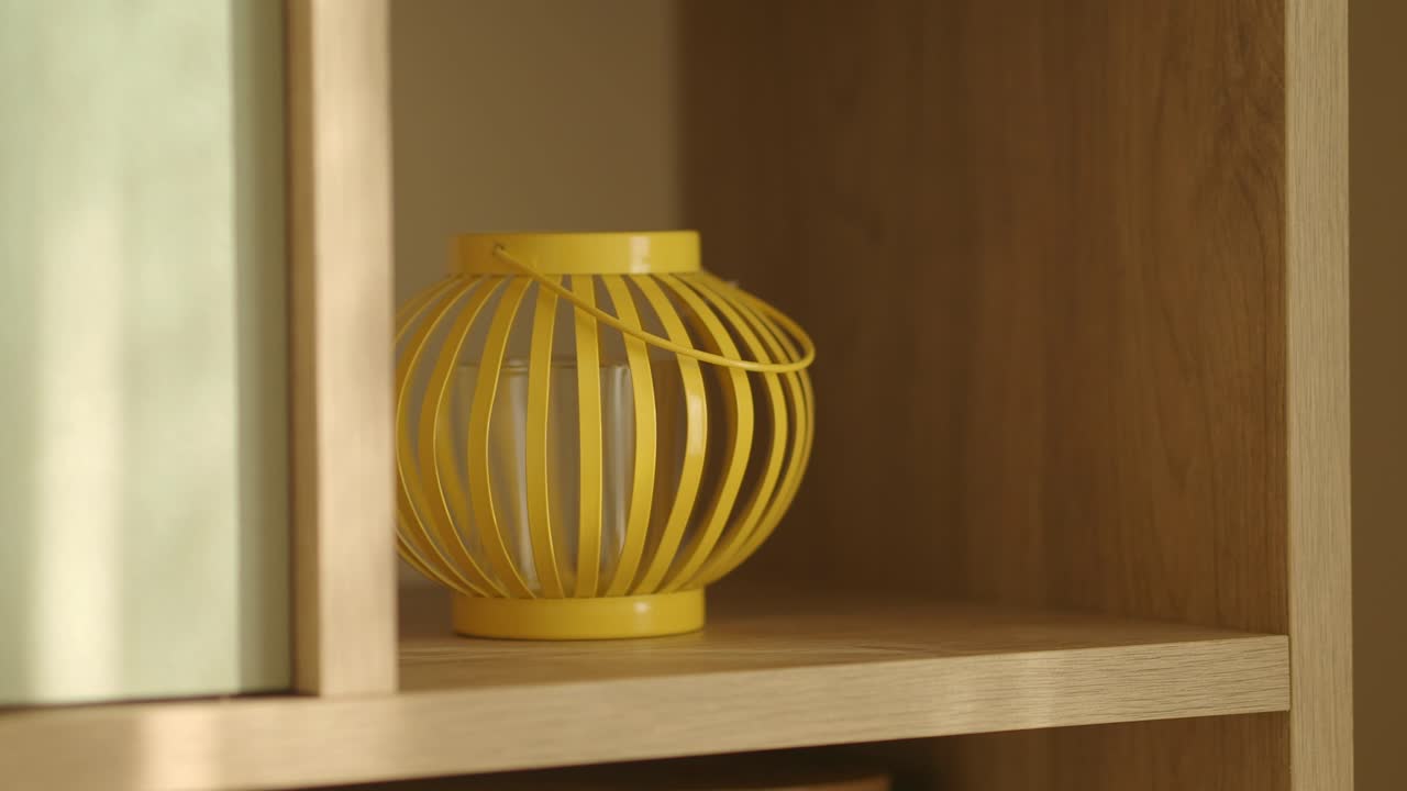 Yellow Lantern on Shelf